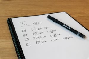 image of pen and notebook checklist